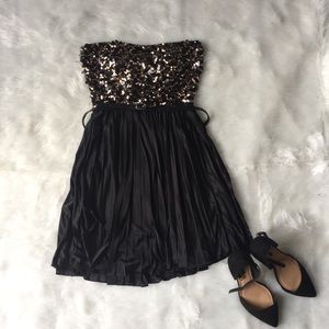 Strapless gold and black sequin dress
